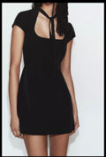 Short dress with bow details
